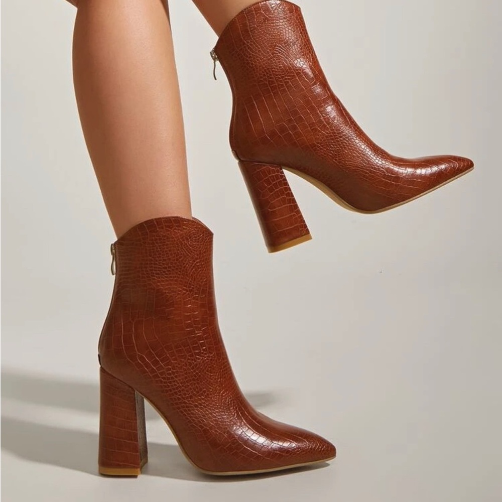 Chunky heeled crocodile print boots